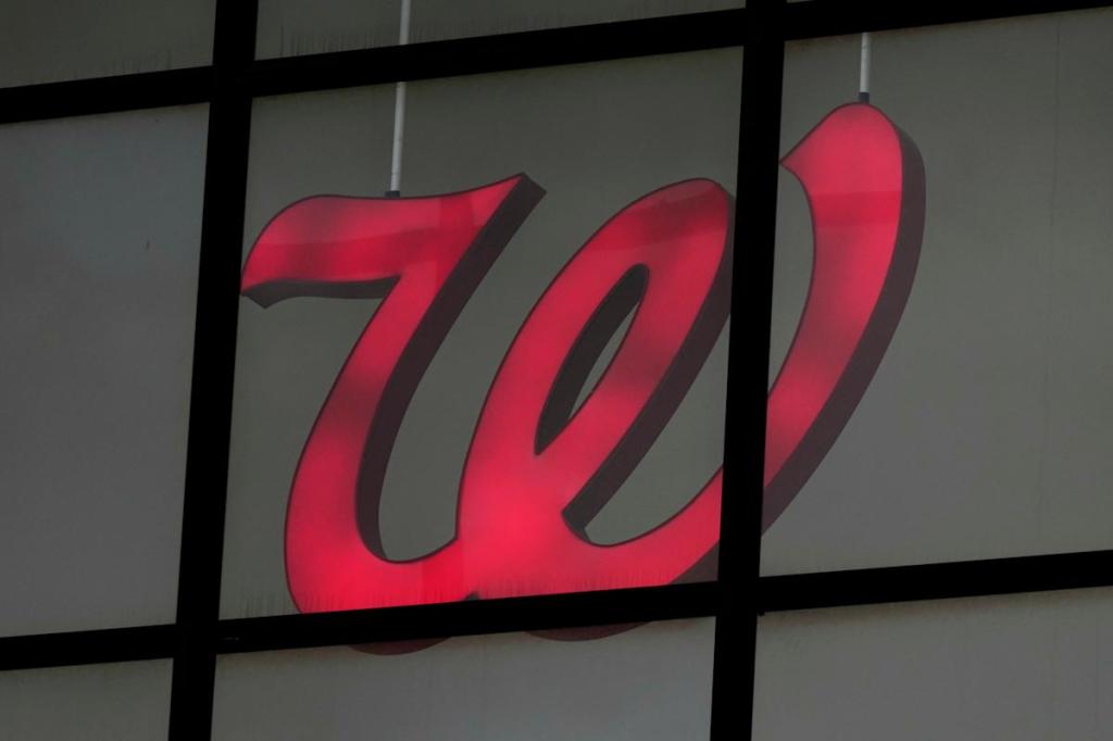 Walgreens tops fiscal 2Q forecasts as private equity buyout&nbsp;awaits